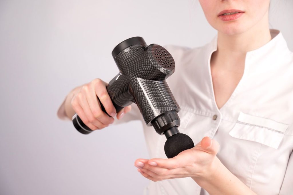 kine utilise pistolet massage